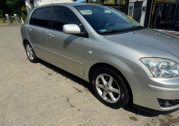 Toyota Corolla cena 10900 przebieg: 238471, rok produkcji 2004 z Warszawa małe 29